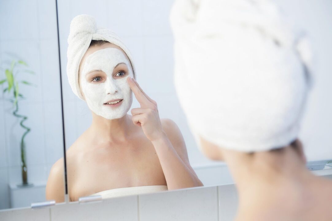 by applying a rejuvenating face mask
